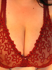 Busty latin woman Diana 34HH in tight red bra