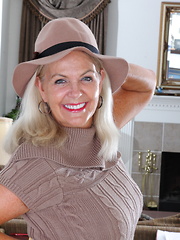 Naughty American mature lady getting ready to play