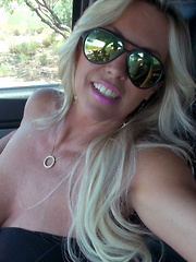 Big Titty MILF Gives Handjob For A Ride